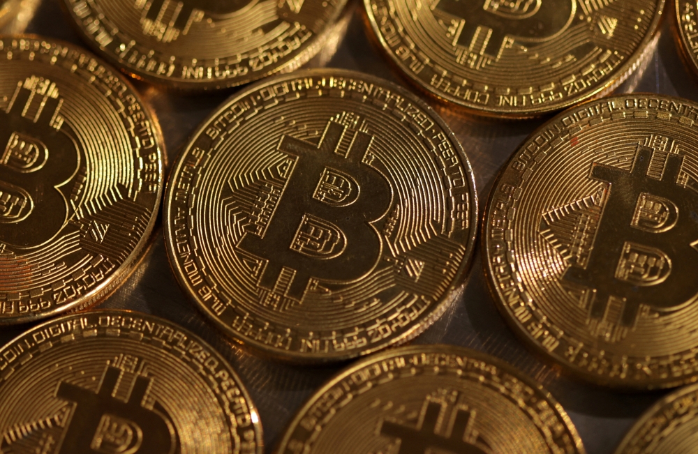 Illustration shows representations of cryptocurrency Bitcoin._Reuters