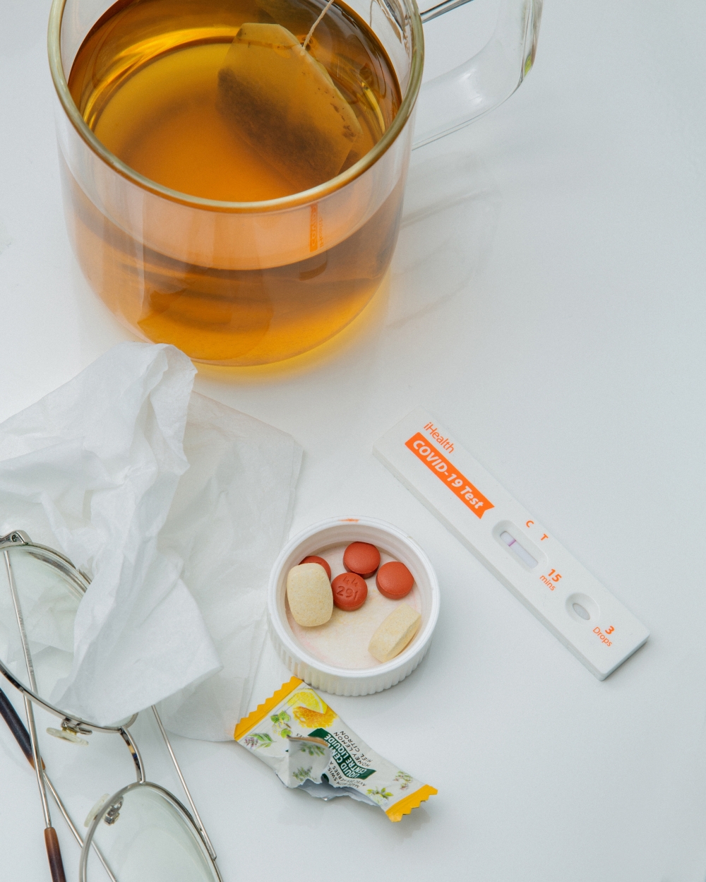 An illustrative image of a COVID-19 test and pills, in New York, Oct. 27, 2023. (Eric Helgas/The New York Times)