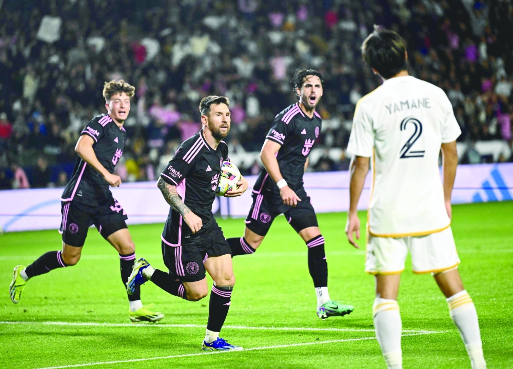 Lionel Messi (10) celebrates his goal 