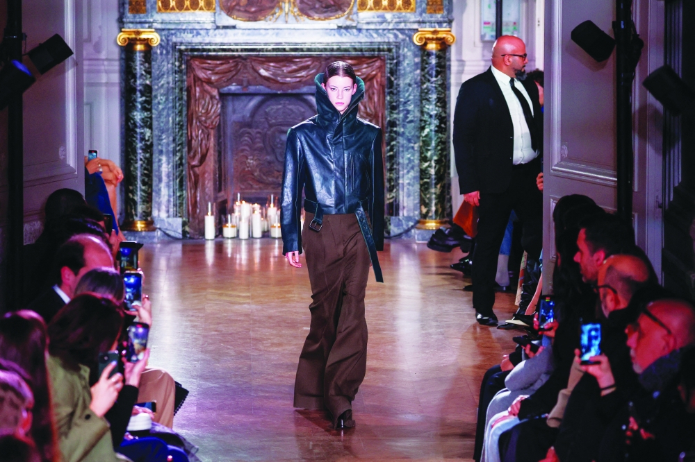 A model presents a creation by designer Victoria Beckham as part of her Fall-Winter 2024/2025 Women's ready-to-wear collection show during Paris Fashion Week, in Paris, France, March 1, 2024. REUTERS/Gonzalo Fuentes

