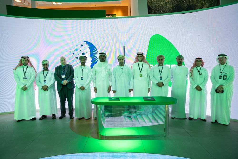 ITHCA Group and Salam officials pose for a photo after the signing agreement ceremony.