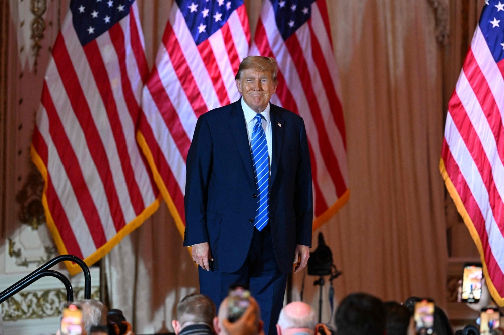 Donald Trump arrives to speak during a Super Tuesday election night watch party at Mar-a-Lago Club in Palm Beach, Florida, on Wednesday. — AFP