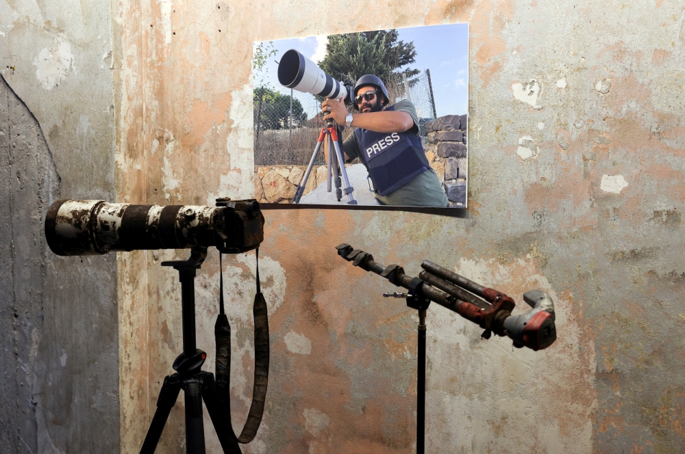 The gear that belonged to Reuters journalist Issam Abdallah is displayed during a press conference by Amnesty International and Human Rights Watch in Beirut. — Reuters file photo