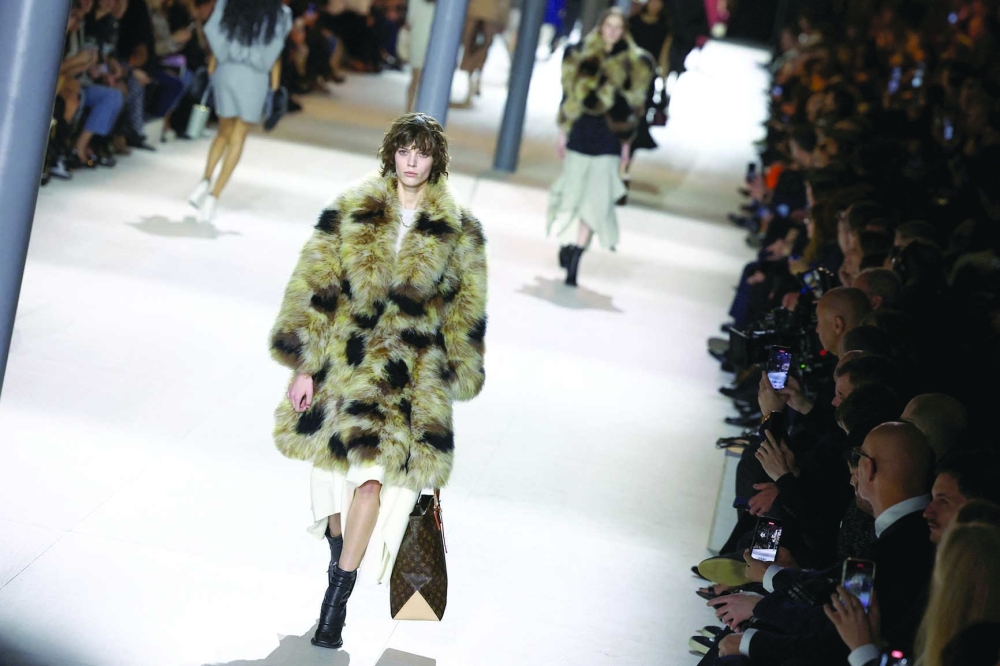 A model presents a creation by designer Nicolas Ghesquiere as part of his Fall-Winter 2024/2025 Women's ready-to-wear collection show for fashion house Louis Vuitton during Paris Fashion Week in Paris, France, March 5, 2024. REUTERS/Stephanie Lecocq
