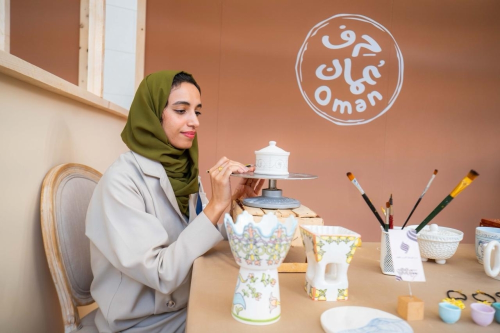 A woman displays her craft at the expo