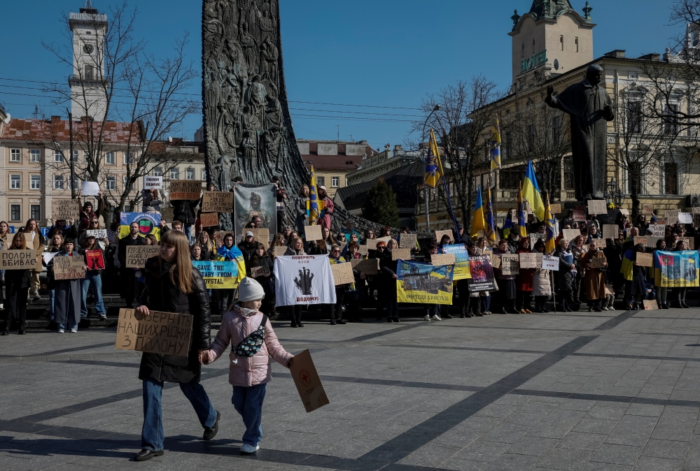 People take part in a rally of families of Ukrainian prisoners of war, calling for the return of their relatives from Russian captivity, in Lviv, Ukraine. — Reuters 