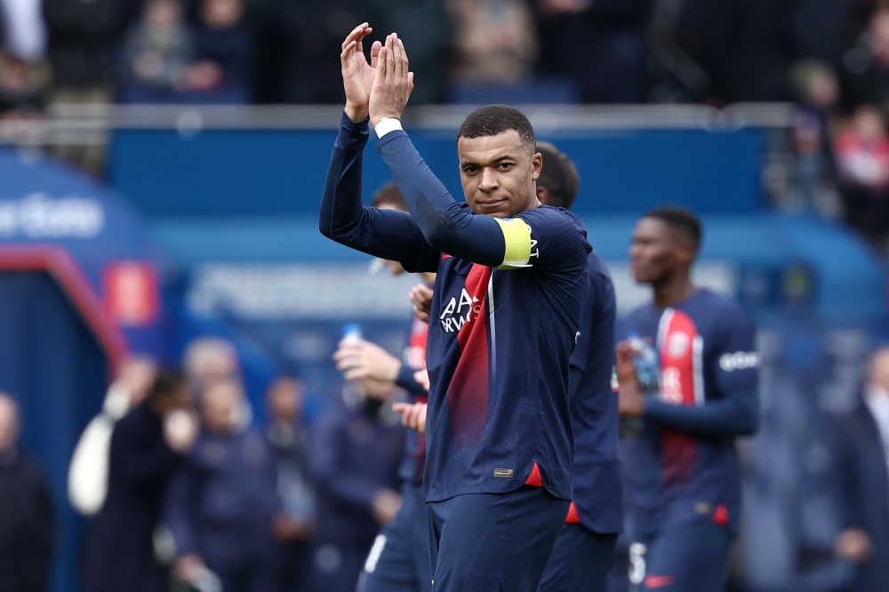 Kylian Mbappe greets supporters at the end of the match.— AFP

