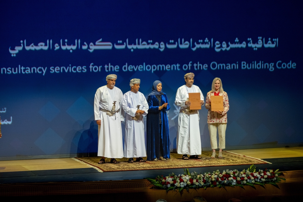 Officials from Oman’s MoHUP and the ICC at the agreement signing in Muscat.