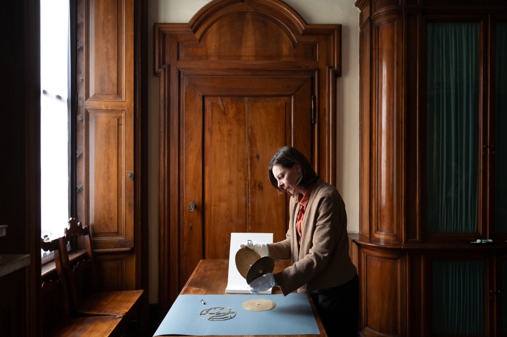 Federica Gigante, a historian at the University of Cambridge, who first noticed an astrolabe, an ancient device used to map the heavens, in a corner of a photograph, at the Fondazione Museo Miniscalchi-Erizzo, a museu  in Verona, Italy, March 7, 2024. (C
