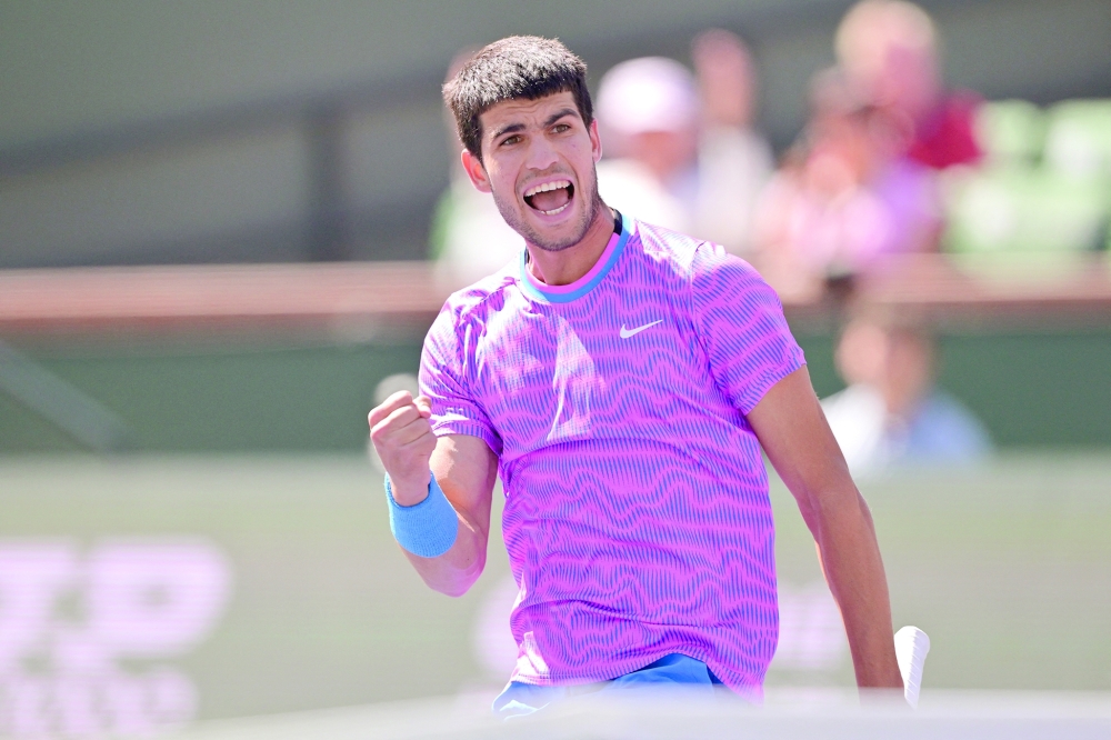 Carlos Alcaraz (ESP) reacts after winning a point.— USA TODAY Sports
