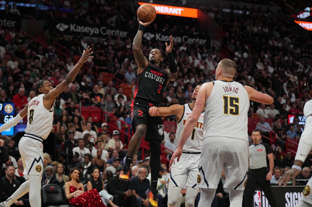 Terry Rozier (2) takes a shot against the Denver Nuggets.—USA TODAY Sports

