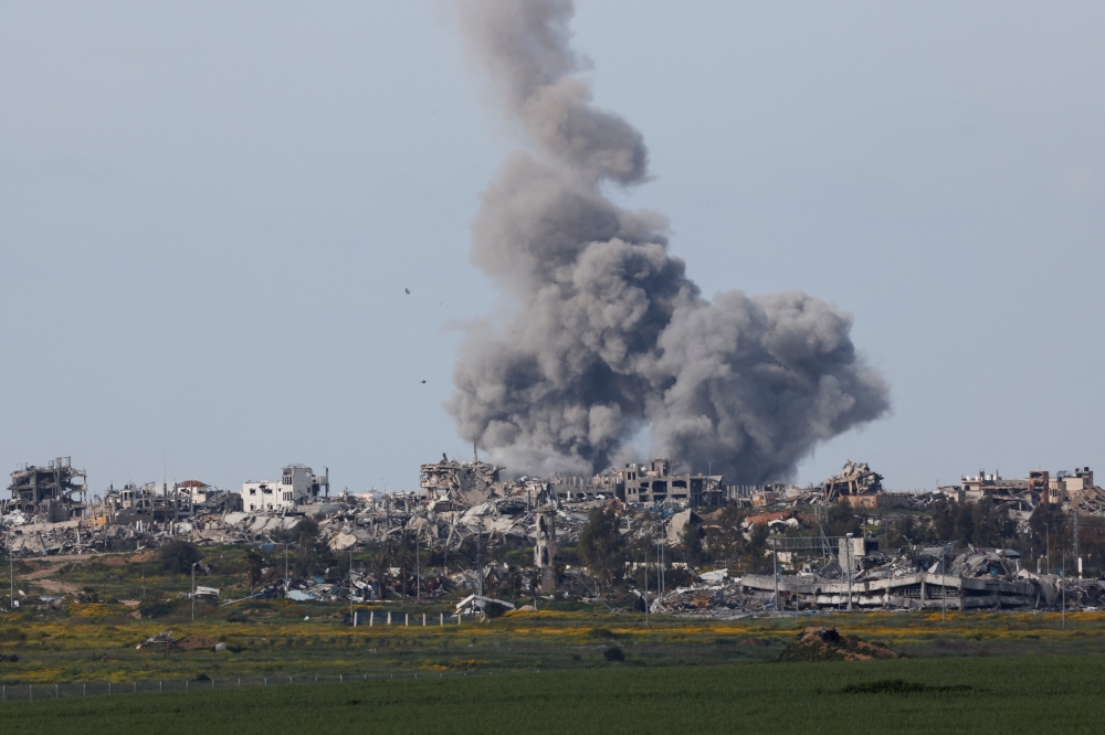 Smoke rises after an explosion in Gaza, amid the ongoing conflict as seen from Israel on Thursday. - Reuters
