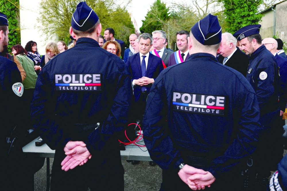 French Interior Minister Gerald Darmanin talks to police drone pilots ahead of the Paris 2024 Olympic Games, in Beynes near Paris. — Reuters