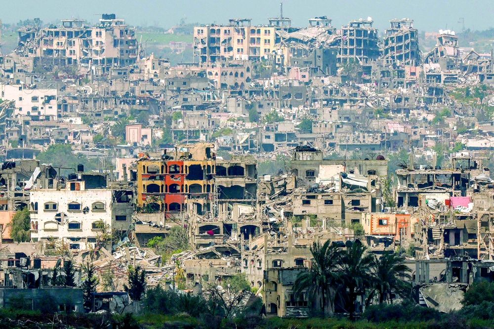 This shows a view of destroyed buildings in the Palestinian territory following Israeli bombardments. — AFP 