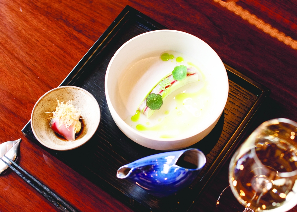 Bonito tataki on potato and white fish sashimi with green ponzu at Sankai by Nagaya, chef Hiroko Shibatas acclaimed new sushi spot at the Bebek Hotel in Istanbul on Jan. 27, 2024. (Gozde Durusoy/The New York Times)