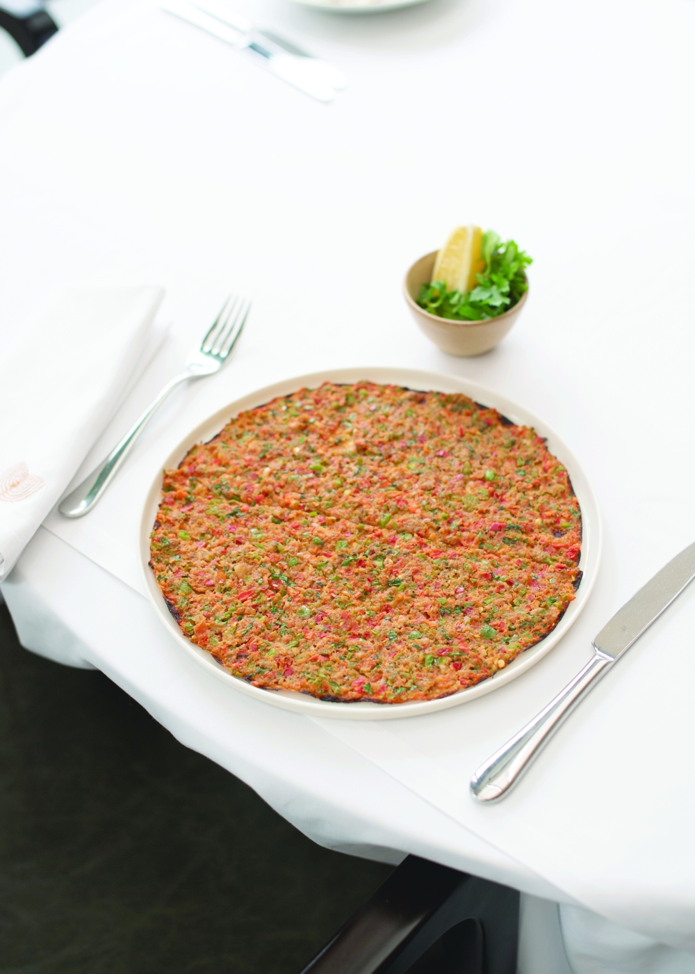 Lahmacun, the humble classic known as Turkish pizza, served at Seraf Vadi in Istanbul, on Jan. 26, 2024. (Gozde Durusoy/The New York Times)