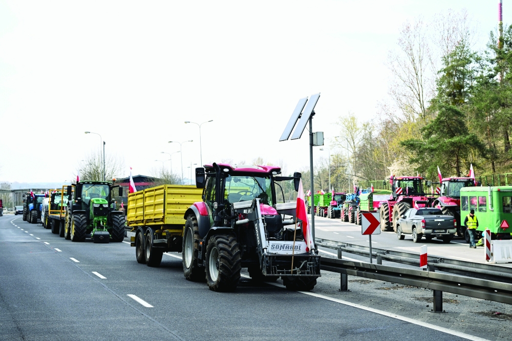 Polish farmers use tractors as they protest against the import of agricultural products from Ukraine, at the Polish-German border, Germany. — Reuters 