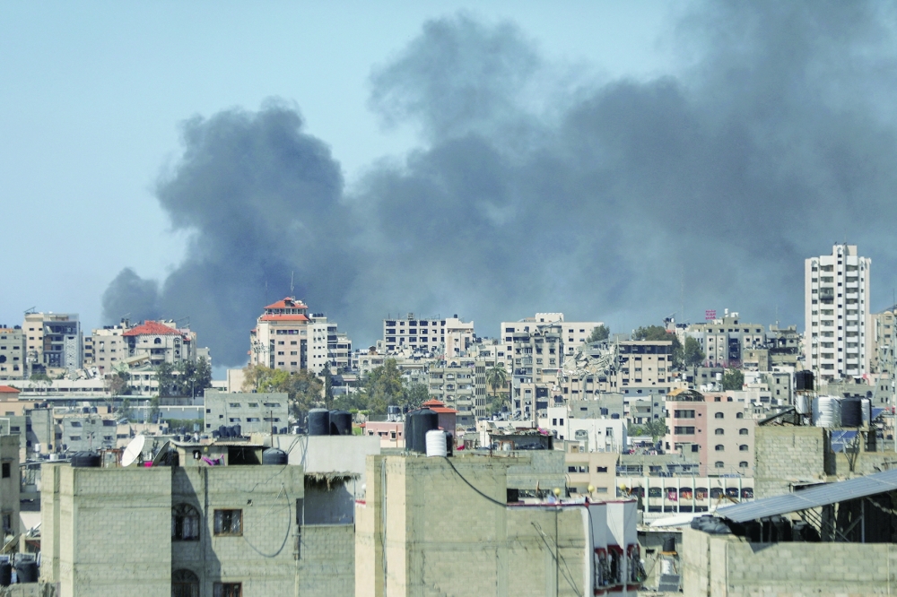 Smoke rises during an Israeli raid at Al-Shifa hospital and the area around it, in Gaza City. — Reuters 