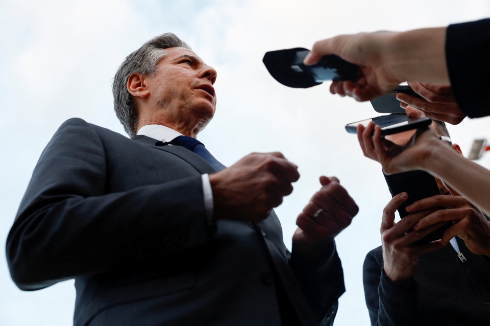 US Secretary of State Antony Blinken speaks to the media, before departing, at Ben Gurion International airport, Tel Aviv
