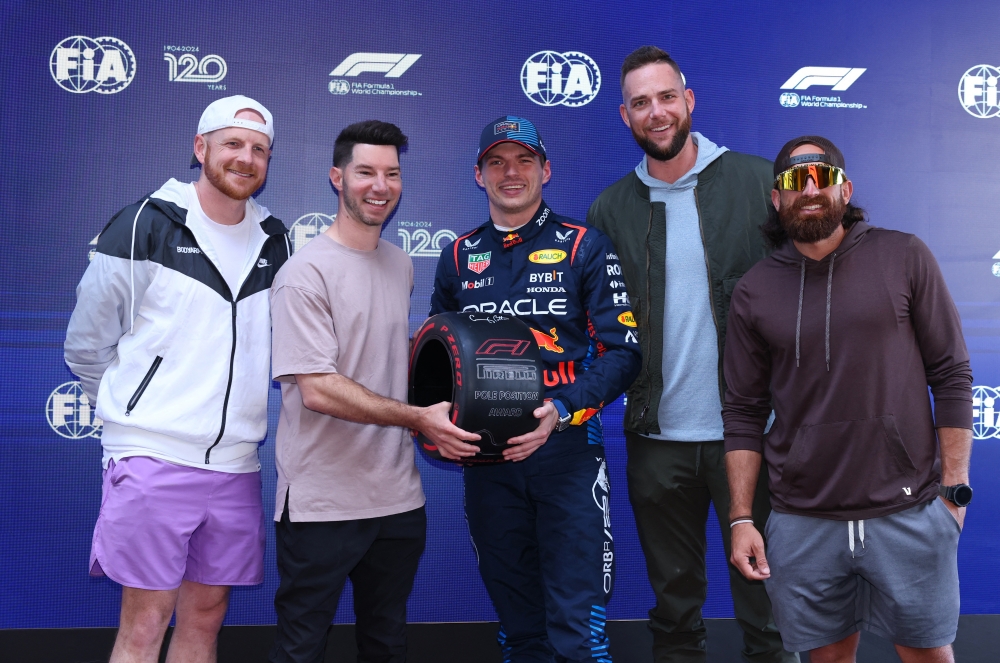  Max Verstappen poses with the pole position award with Dude Perfect.— REUTERS