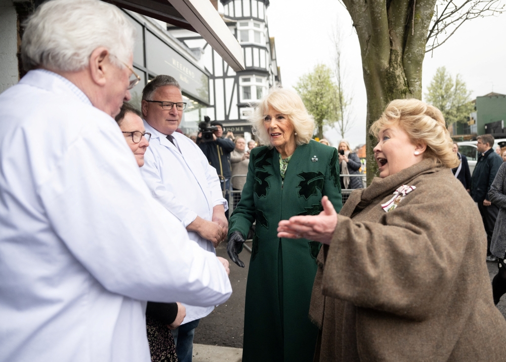 Britain's Queen Camilla visits Coffey's Butchers, during her visit to Northern Ireland