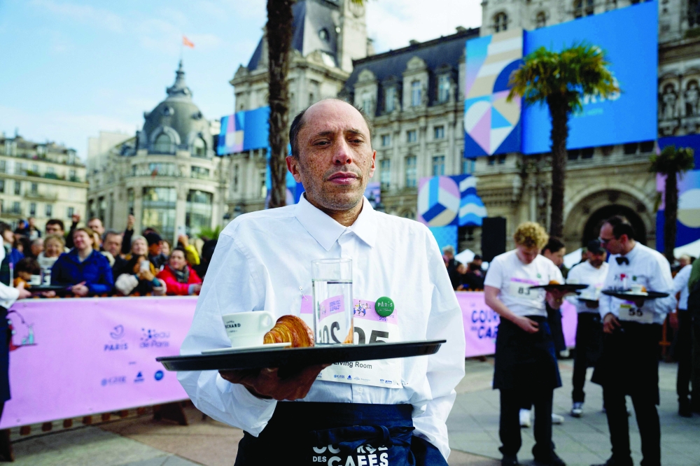Paris crowns champion waiters in one-of-a-kind 'cafe race'