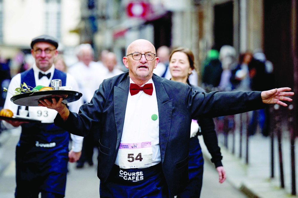 Paris crowns champion waiters in one-of-a-kind 'cafe race'