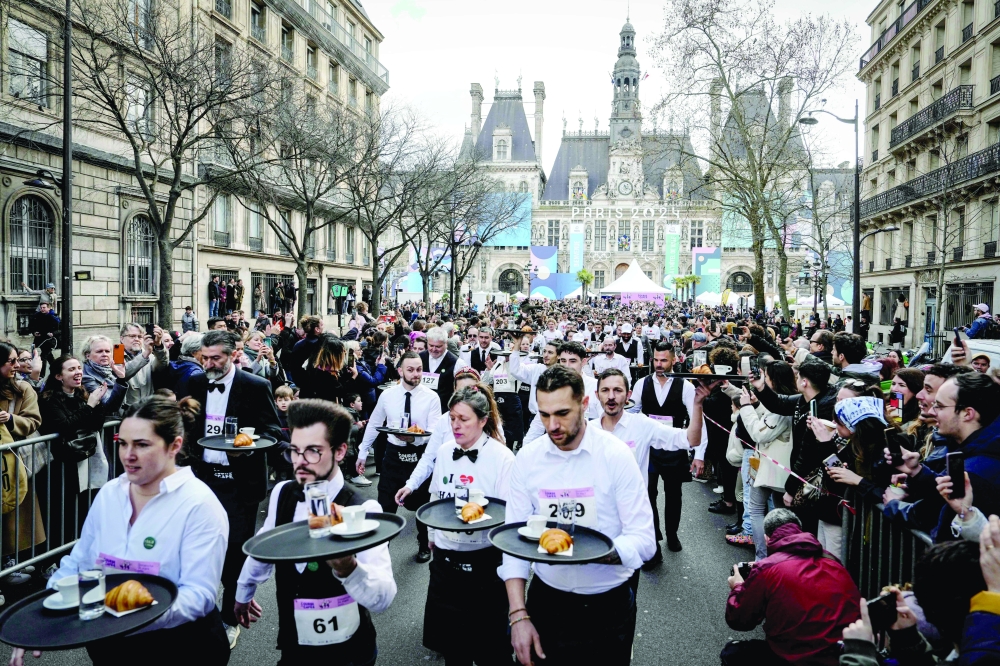 Paris crowns champion waiters in one-of-a-kind 'cafe race'