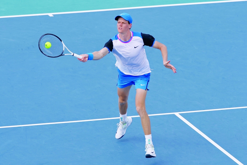 Mar 26, 2024; Miami Gardens, FL, USA; Jannik Sinner (ITA) hits a volley against Christopher O'Connell (AUS) (not pictured) on day nine of the Miami Open at Hard Rock Stadium. Mandatory Credit: Geoff Burke-USA TODAY Sports
