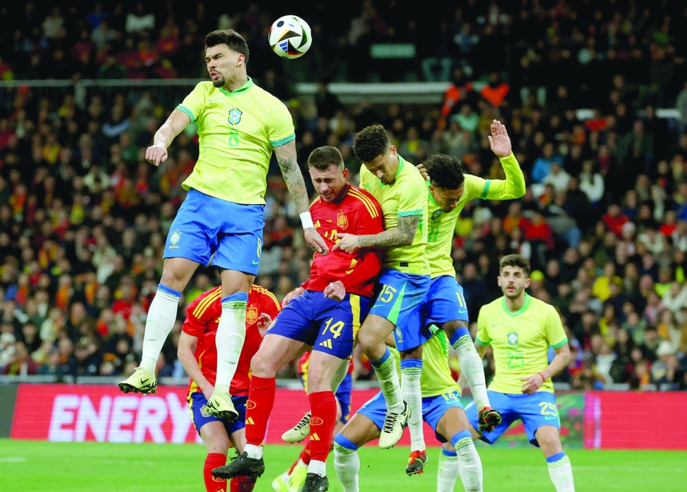 Brazil fight back to draw six-goal thriller with Spain