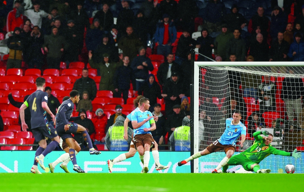 Soccer Football - International Friendly - England v Belgium - Wembley Stadium, London, Britain - March 26, 2024 England's Jude Bellingham scores their second goal past Belgium's Matz Sels Action Images via Reuters/Matthew Childs