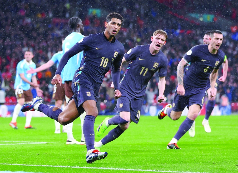 Soccer Football - International Friendly - England v Belgium - Wembley Stadium, London, Britain - March 26, 2024 England's Jude Bellingham celebrates scoring their second goal with Anthony Gordon REUTERS/Carl Recine