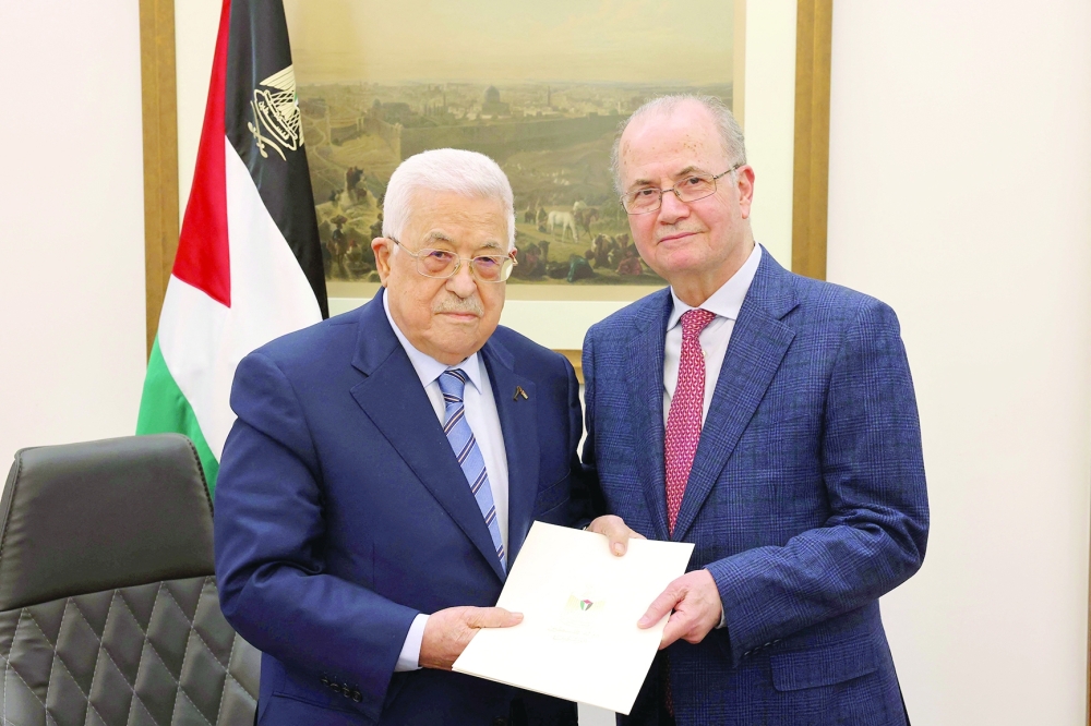 Palestinian President Mahmoud Abbas with Mohammed Mustafa, Prime Minister of the Palestinian Authority in Ramallah. - Reuters File