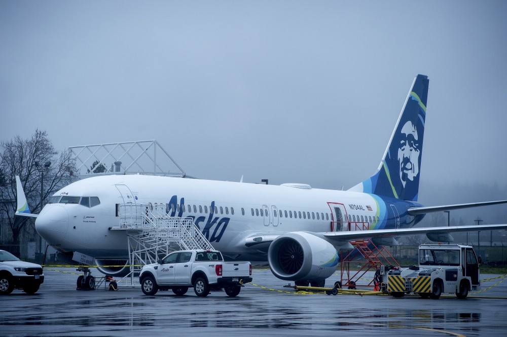 Alaska Airlines N704AL, a Boeing 737 Max 9 that had a door plug blow out from its fuselage midair, parked at a maintenance hanger at Portland International Airport