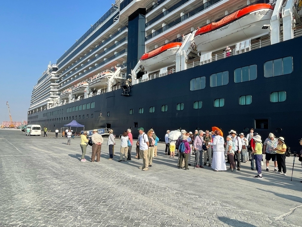 Tourists disembarking from a cruise ship at Port of Salalah.