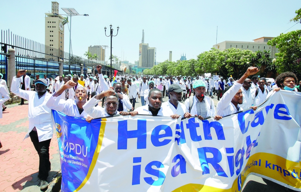 Medical practitioners participate in a demonstration against the government's failure to hire trainee doctors in Nairobi. — Reuters file photo 