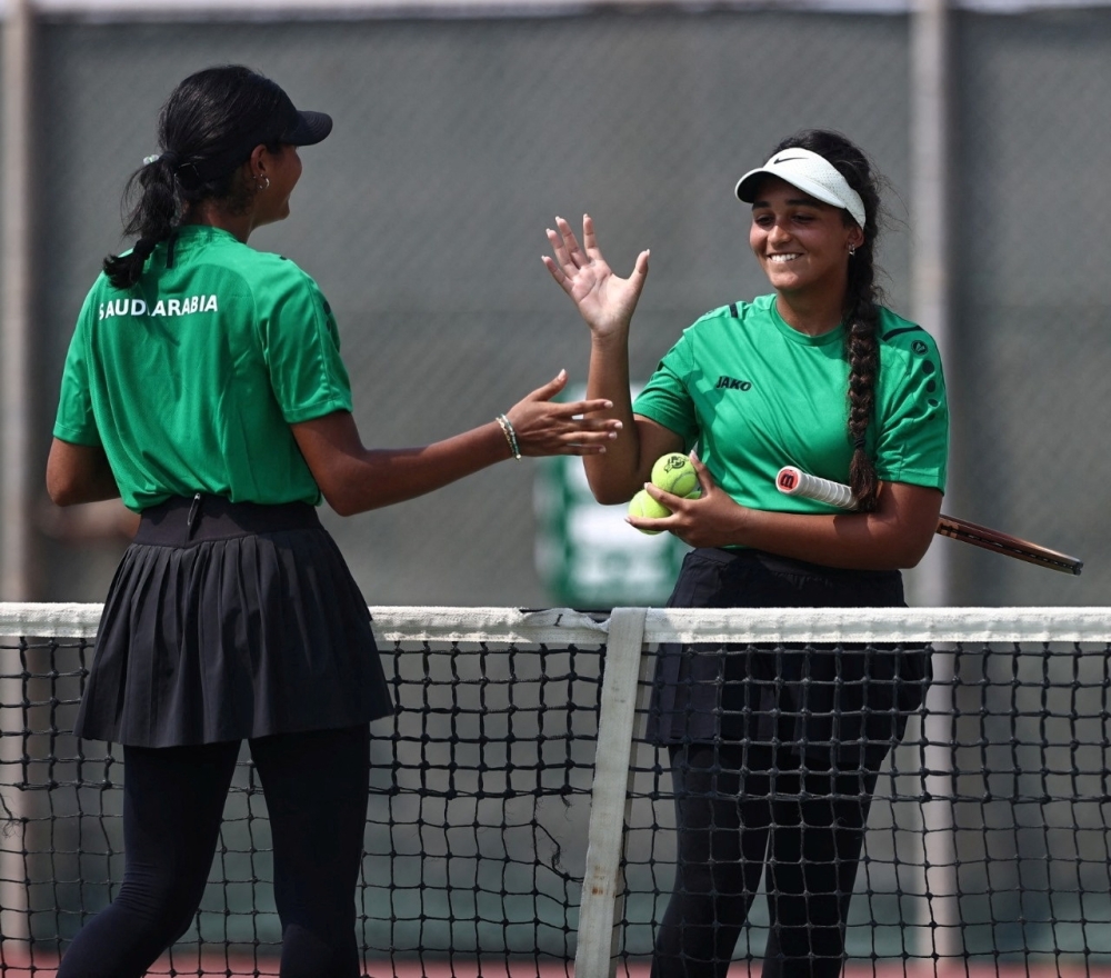 Saudi tennis players gesture in Riyadh, Saudi Arabia, in this undated handout photo released by the Saudi Tennis Federation on April 4, 2024. The Women Tennis Association and Saudi Sports Ministry announced that the season-ending WTA Finals will be held in Saudi Arabia's capital Riyadh from 2024-2026. Saudi Tennis Federation/Handout via REUTERS