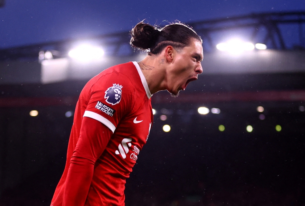 Soccer Football - Premier League - Liverpool v Sheffield United - Anfield, Liverpool, Britain - April 4, 2024 Liverpool's Darwin Nunez celebrates scoring their first goal REUTERS