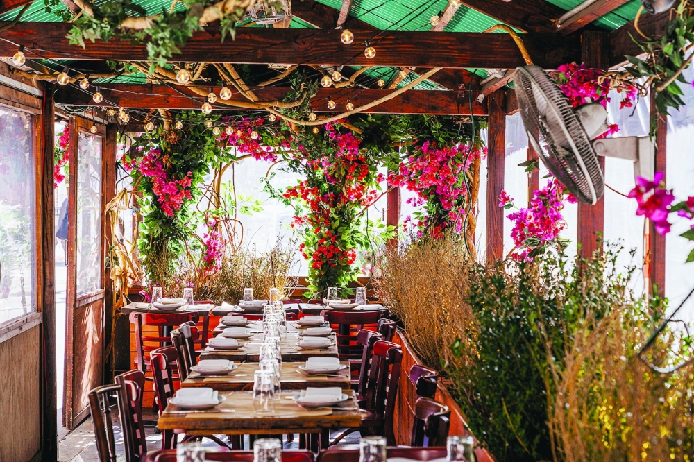 An elaborate faux flower installation above the outdoor dining area of Da Andrea, on Manhattan’s Union Square on March 14, 2024. 