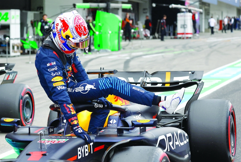 Max Verstappen steps out of the car after qualifying.— REUTERS