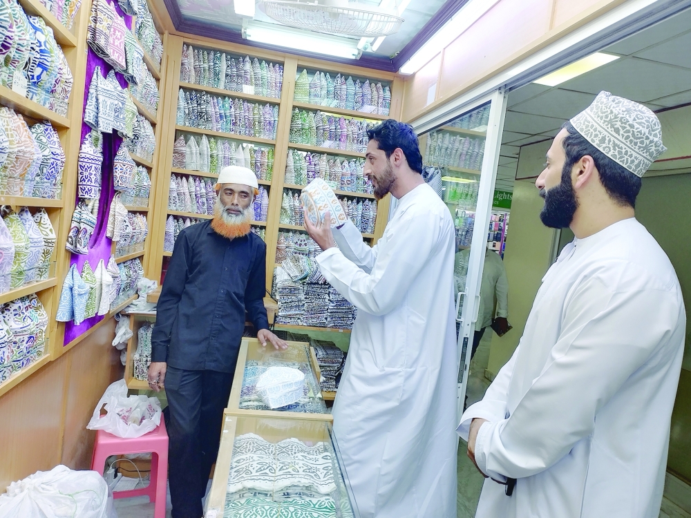 Shoppers at Oman Commercial Centre in Ruwi on Friday.