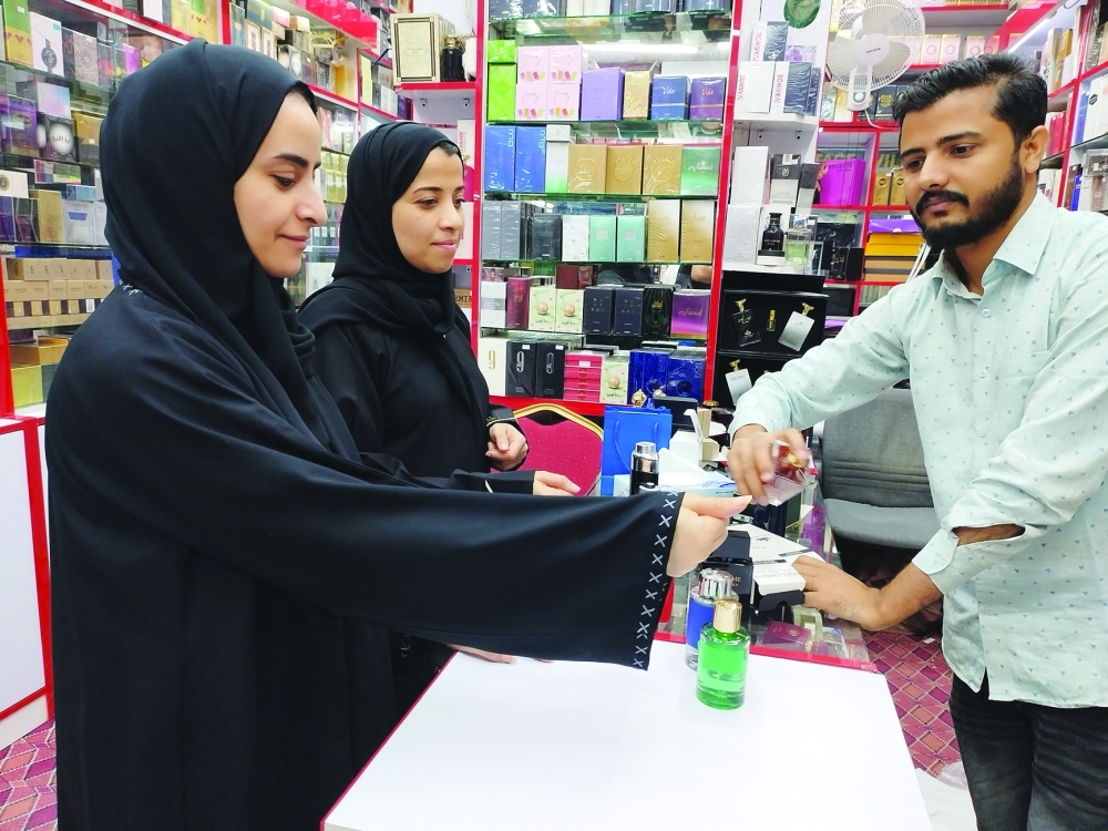 Shoppers at Oman Commercial Centre in Ruwi on Friday.