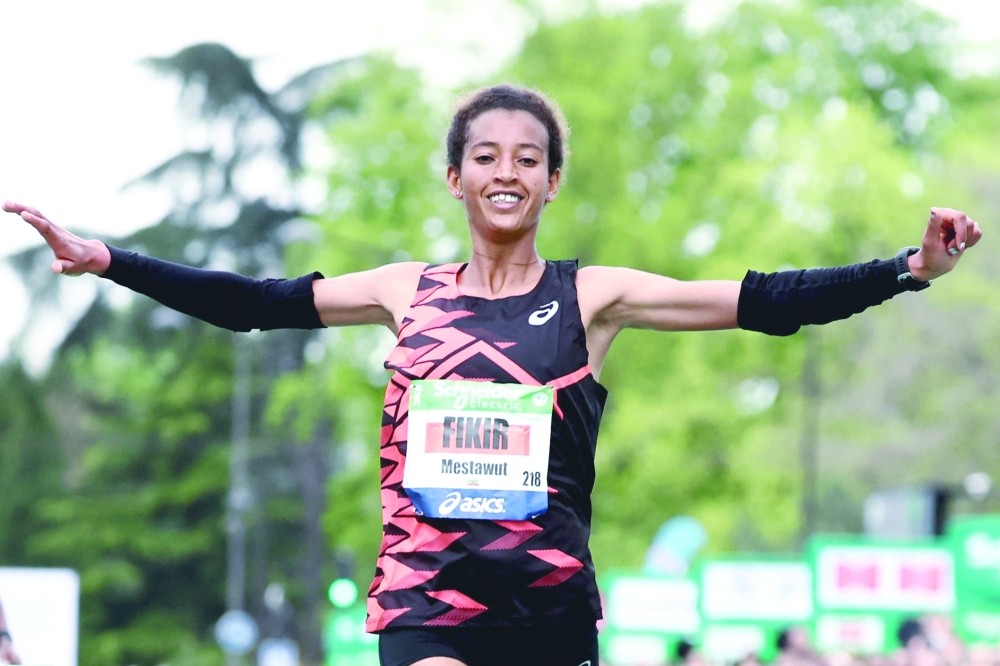 Ethiopia's Mestawut Fikir celebrates after the wining. — REUTERS