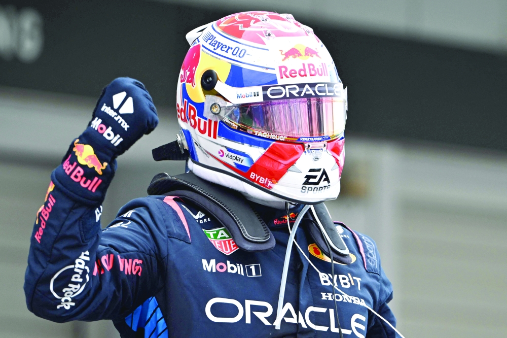 Max Verstappen celebrates the winning. —  AFP

