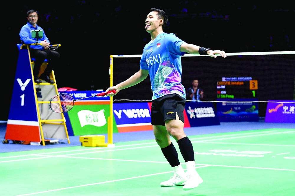 Indonesia Jonatan Christie reacts after a point during his men's singles final match -- AFP
