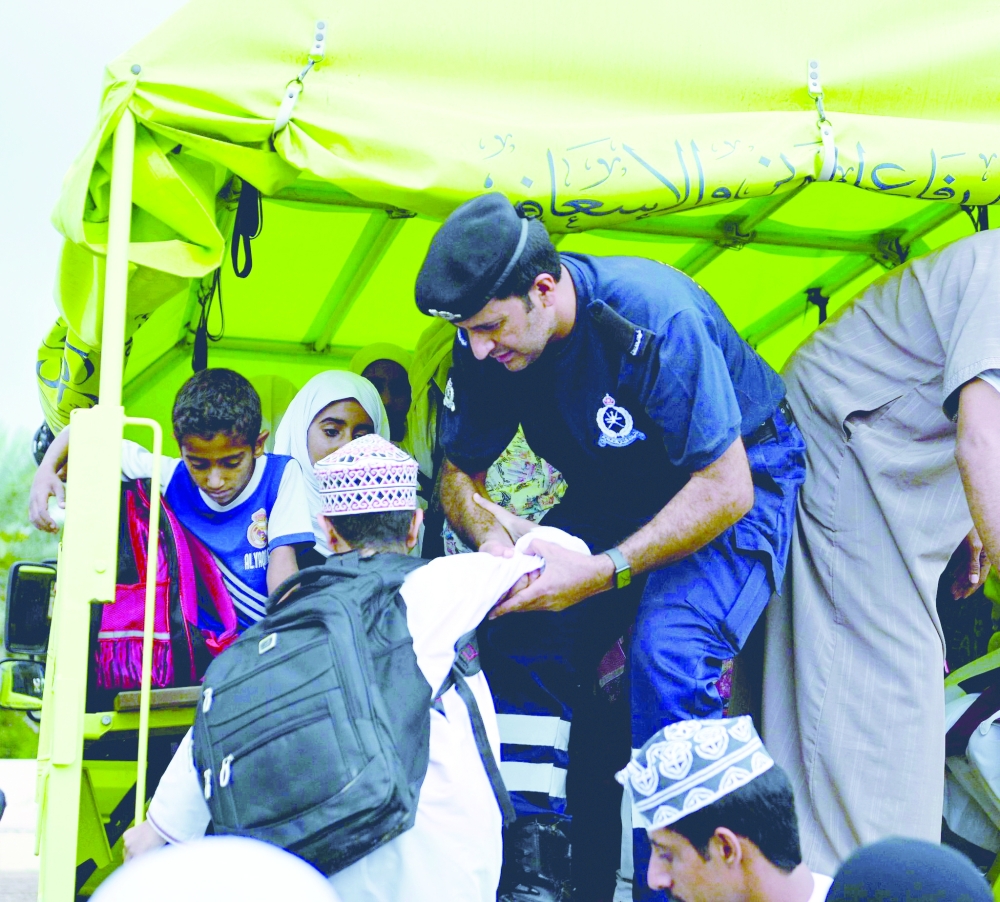 12 dead, including 9 students, in flash floods