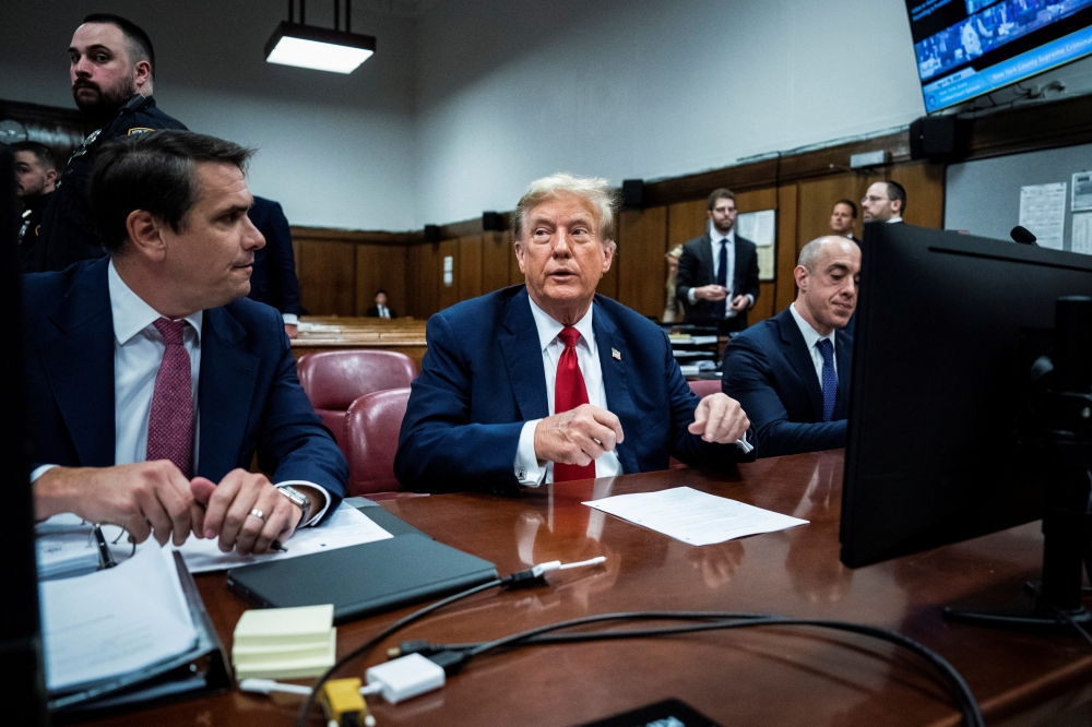Former U.S. President Donald Trump arrives at Manhattan criminal court with his legal team ahead of the start of jury selection in New York. — Reuters 