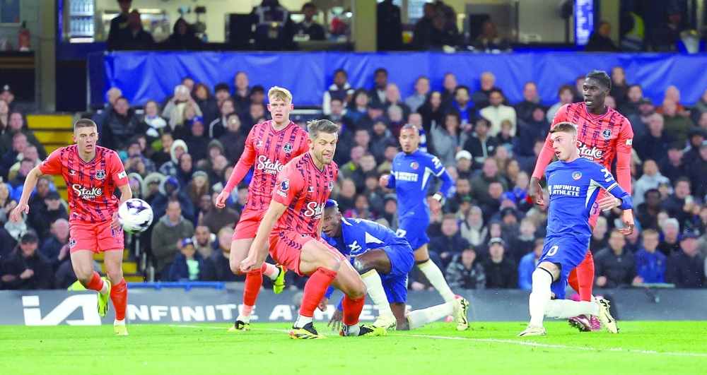 Chelsea's Cole Palmer scores their first goal.