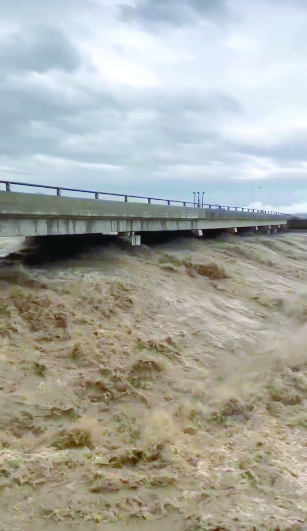 Wadi waters in full force rip into roads