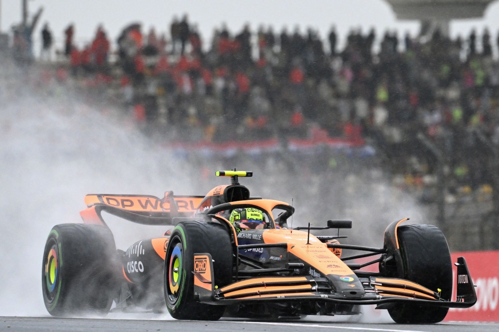 McLaren's British driver Lando Norris drives during the sprint qualifying session ahead of the Formula One Chinese Grand Prix at the Shanghai International Circuit in Shanghai